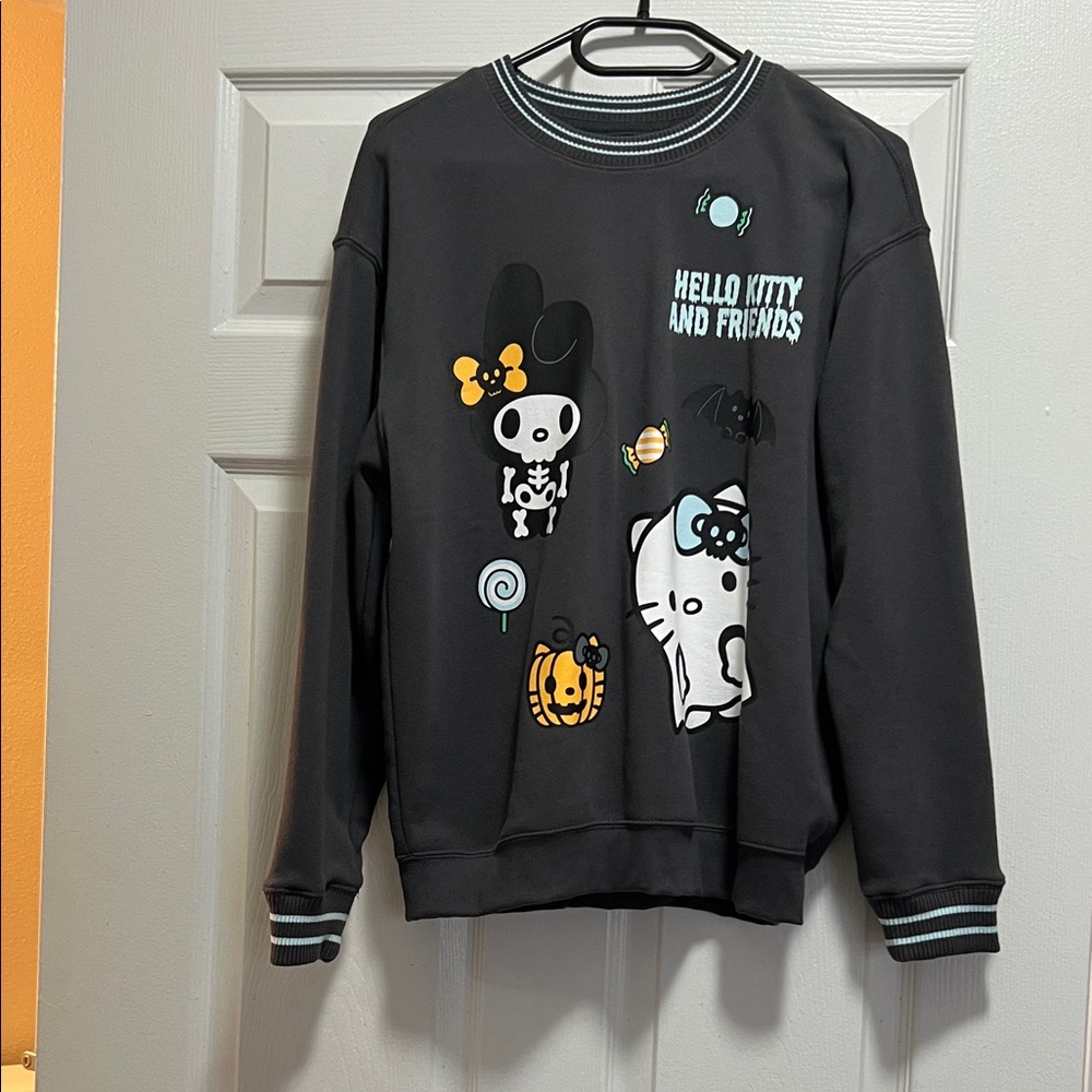 Sanrio Hello Kitty and Friends Black Sweater with Teal and Orange Accents